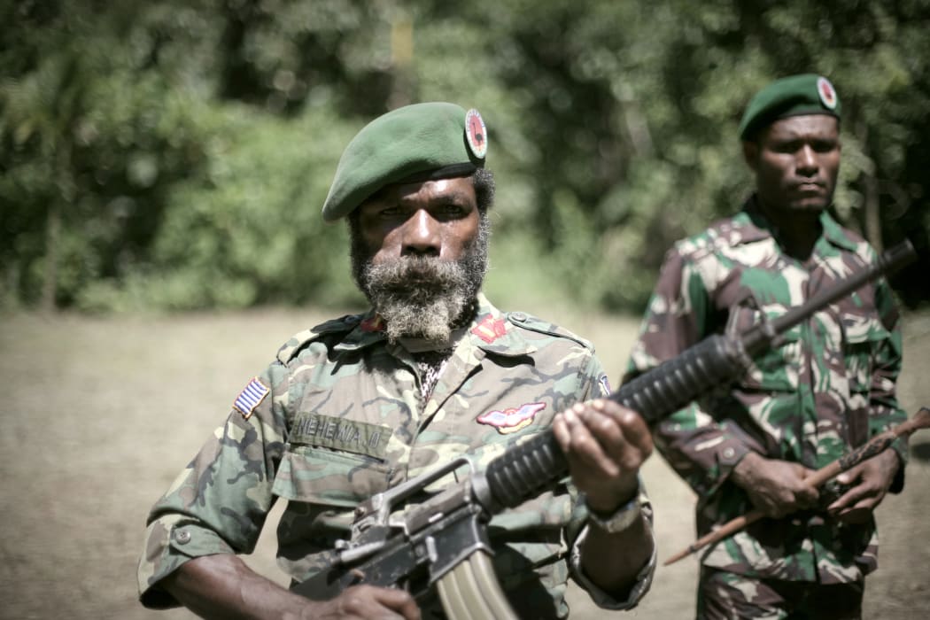 West Papuan guerrillas of the OPM or Organisasi Papua Merdeka at their headquarters in the jungle of Papua.