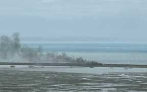 Smoke from the fire on the Nelson Boulder Bank.