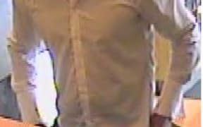 The man threatened a teller and bank customers before taking cash and fleeing