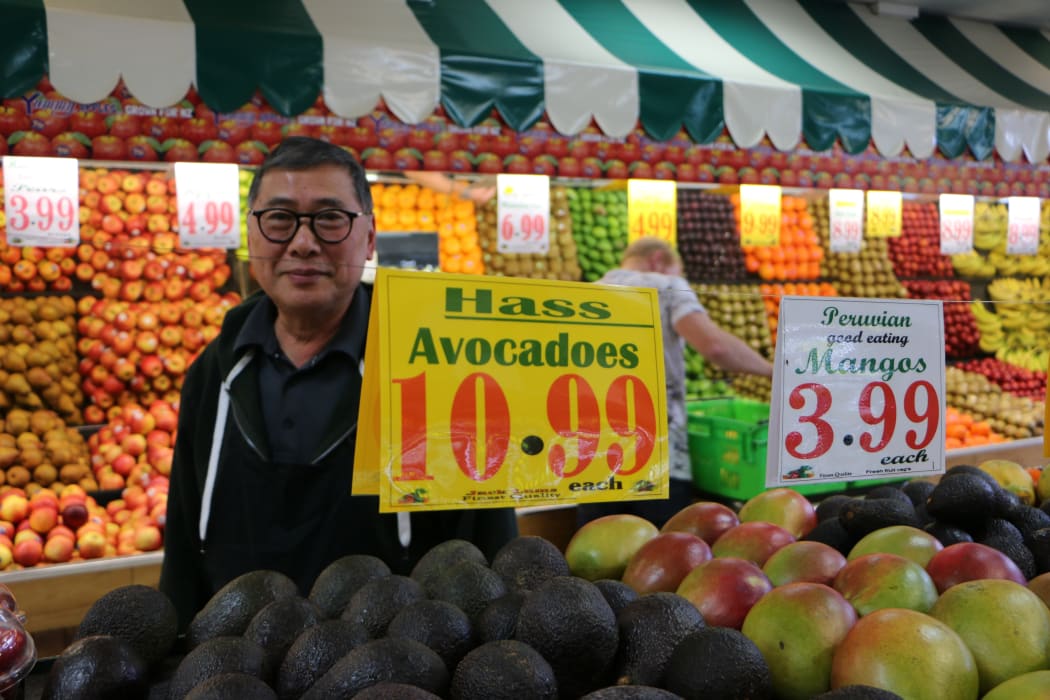 Avocados for sale at $10.99 each in Jack Lum's Auckland greengrocery.
