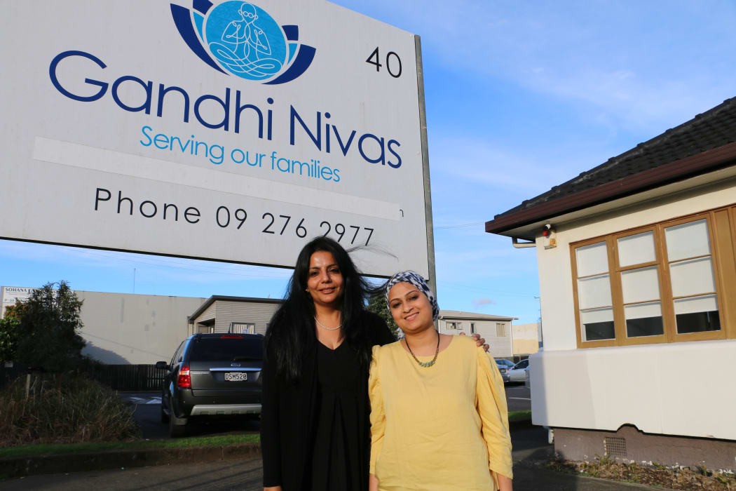 Counseling the men, Sucharita Varma (left) and Zoya Kara at Gandhi Nivas.