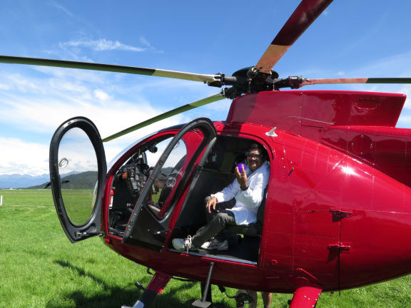 A photo of Shailesh Goswami holding a ball made of the tough gel that will be thrown from the helicopter