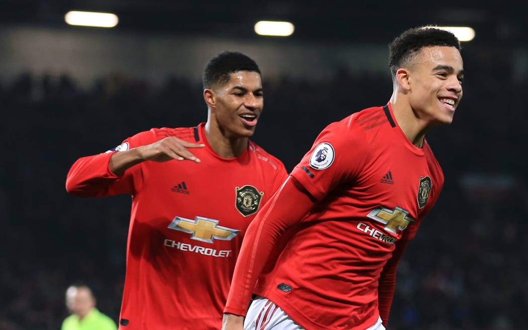 Mason Greenwood of Man Utd celebrates with teammate Marcus Rashford.