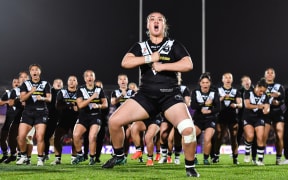 Mya Hill-Moana of New Zealand leads the Haka at the Rugby League World Cup in England.