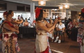 Shiray Kaka in her traditional Samoan attire performing a Siva Samoa.