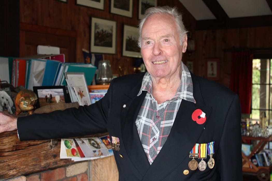 Former international airline pilot Nicholas Murray Leslie now produces tea tree oil.He is wearing his service medals standing in his lounge at home in Whitianga.