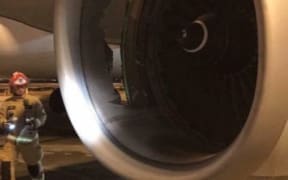 A massive hole in one of its engines has forced a China Eastern Airlines plane bound for Shanghai to return to Sydney Airport after about an hour in the air.