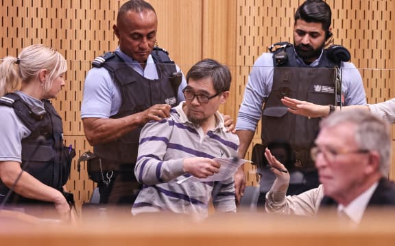 130625 CHRIS SKELTON (POOL)
Tingjun Cao interjects at his sentencing for the murder of real estate agent Yanfei Bao.