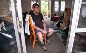 Residents on Camphora Place in West Auckland's Ranui are picking up the pieces at their homes after Momutu Stream overflowed and flooded their properties. Mark Griffin (pictured) says it's the second time it's flooded in 18 months.