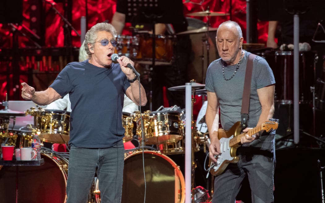 Roger Daltrey (L) and Pete Townshend of British rock band "The Who" perform at the Toyota Center on the second leg of their Moving On! tour on September 25, 2019 in Houston, Texas. (Photo by SUZANNE CORDEIRO / AFP)