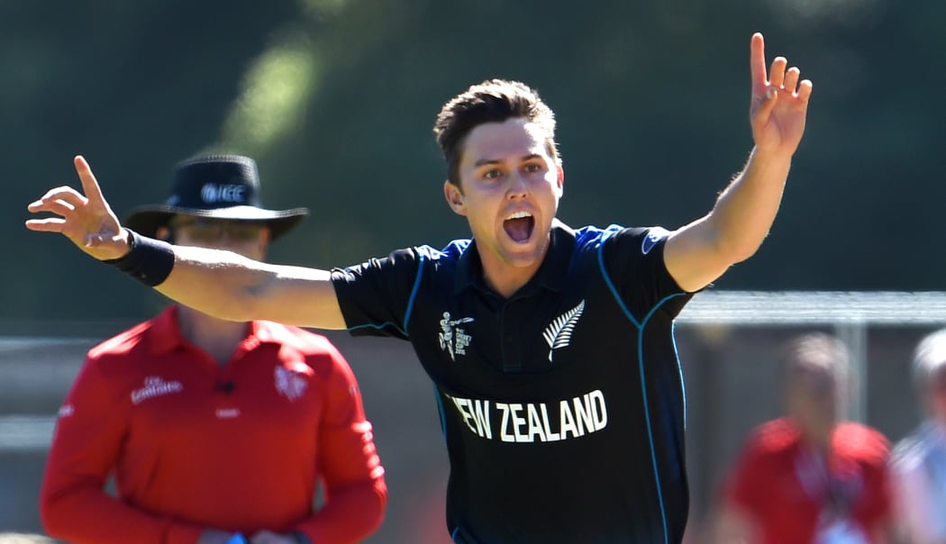 New Zealand bowler Trent Boult celebrates after dismissing Scotland batsman Hamish Gardiner.