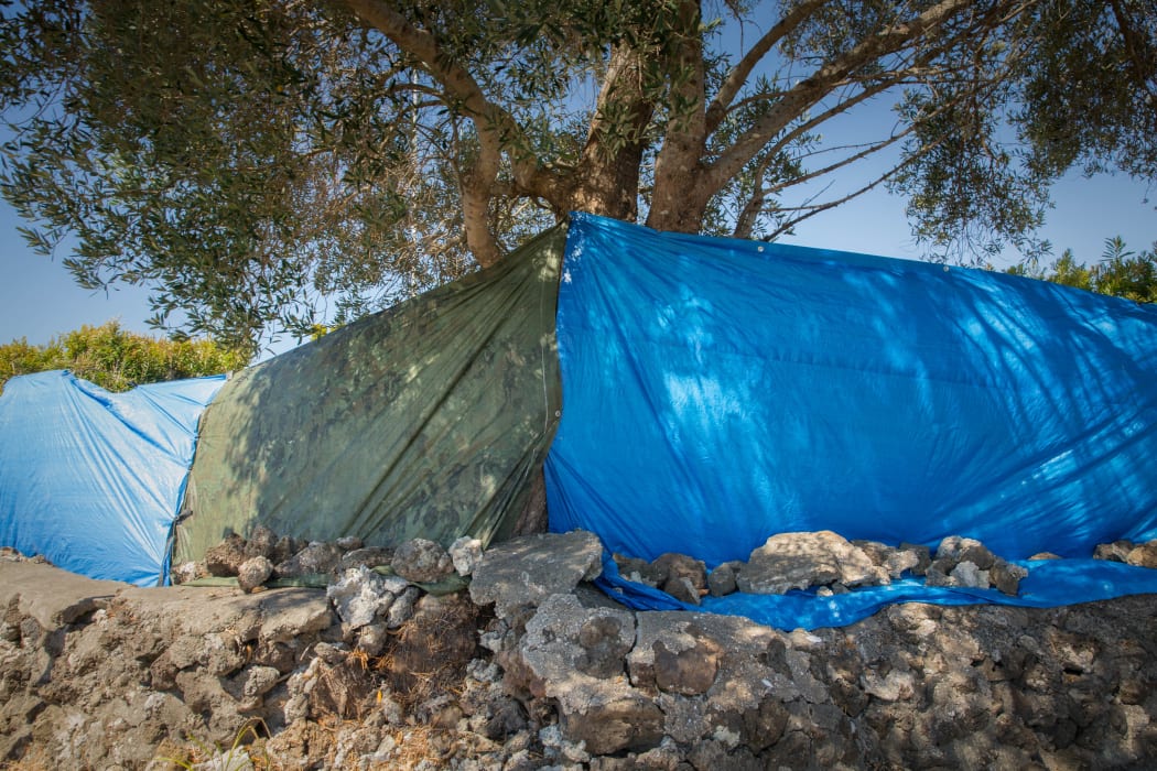 A tarpaulin erected to prevent media from filming proceedings on Te Tii Marae.