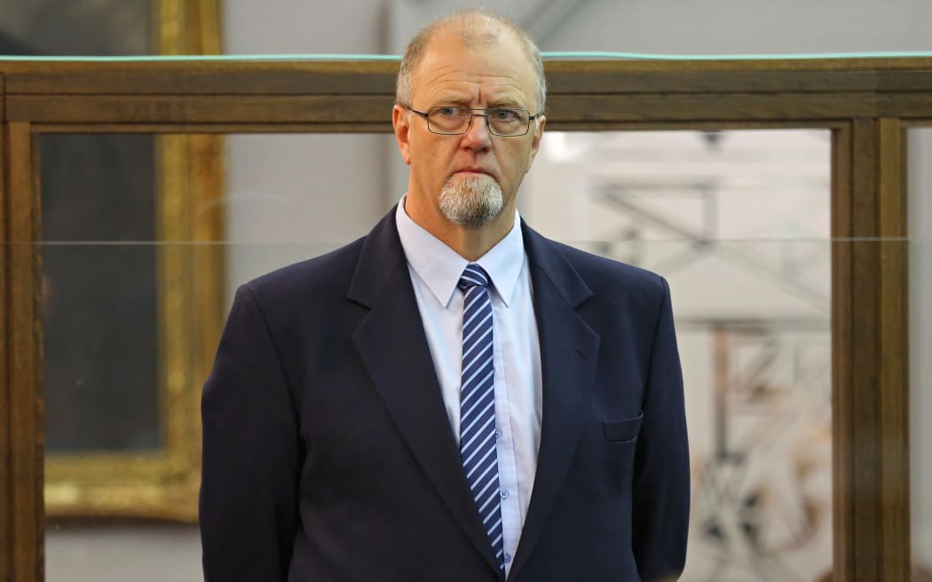 Mark Lundy looking at the jury as they enter the court room.
