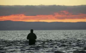 A fisher at Lake Taupo.