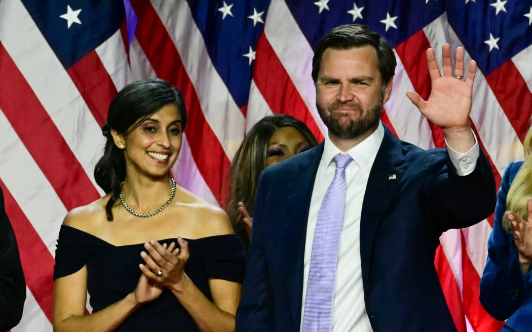 Republican vice presidential candidate J.D. Vance and his wife Usha Vance attend an election night event with former US President and Republican presidential candidate Donald Trump at the West Palm Beach Convention Center in West Palm Beach, Florida, early on November 6, 2024. (Photo by Jim WATSON / AFP)