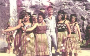 Elvis Presley with New Zealand Māori wahine, at the Polynesian Cultural Centre on Oahu, Hawaii, after the filming of Paradise, Hawaiian Style in 1966.