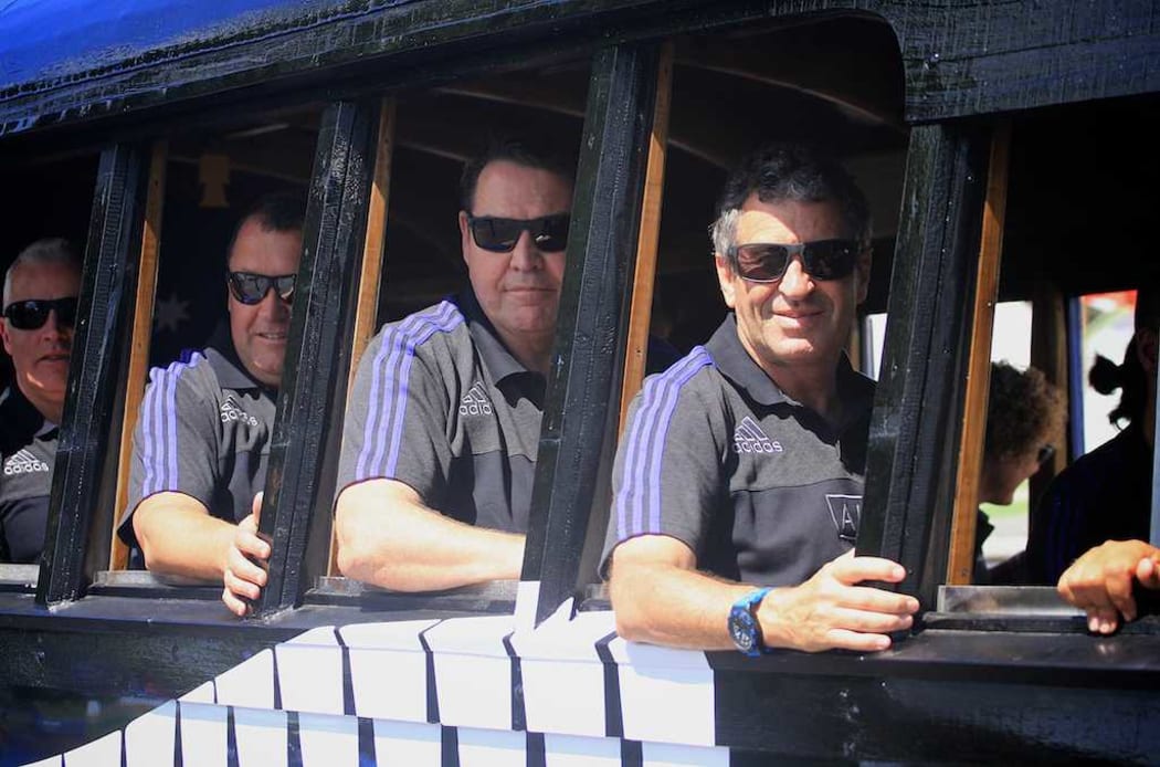 Coach Steve Hansen, second from right, and assistant coach Wayne Smith during a parade for the New Zealand All Blacks.