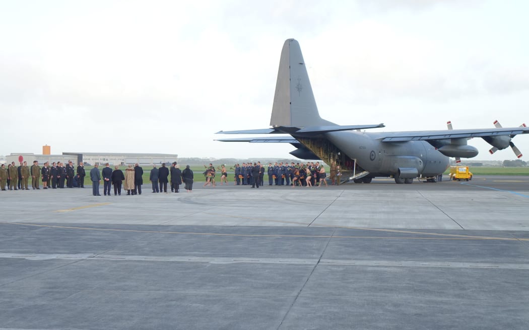 The remains of three servicemen repatriated from Fiji and American Samoa arrive at the Ōhakea Airforce Base.