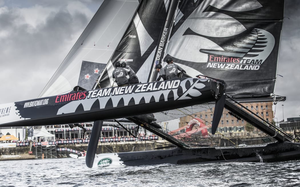 Team New Zealand competing on the final day of racing in the Extreme Sailing Series on Cardiff Bay.