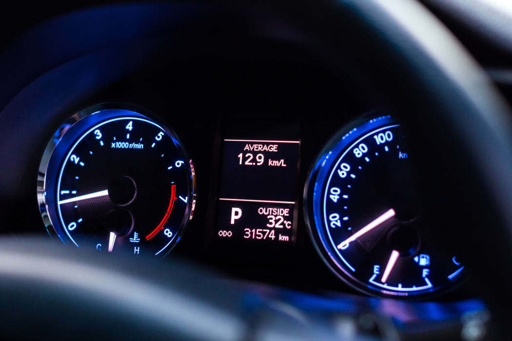 speedometer car mileage close up car temperature