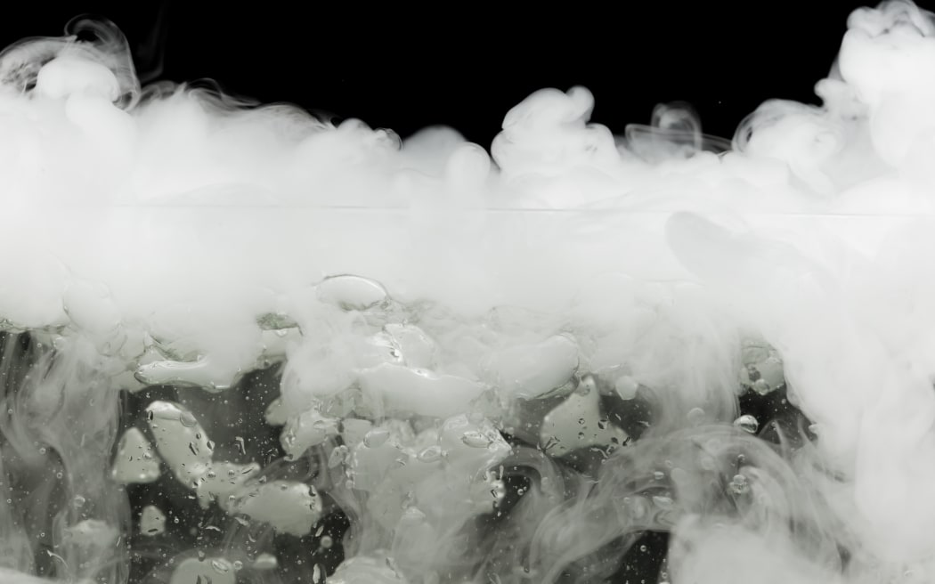 boiling dry ice with vapor, closeup view