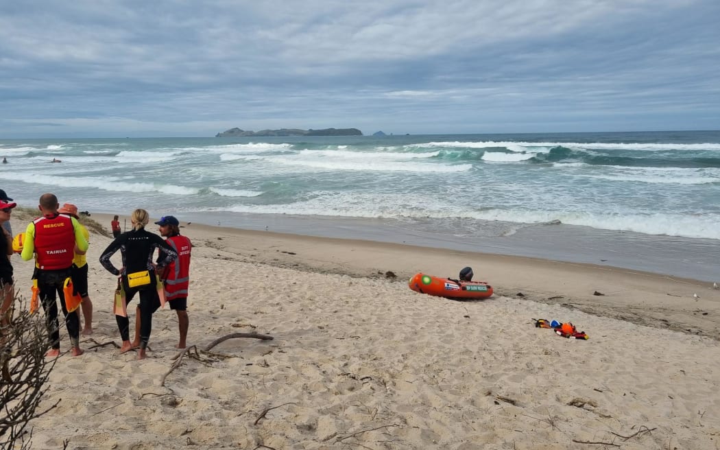 Surf Lifesaving crews at Opoutere Beach after a group of seven people signalled for help.