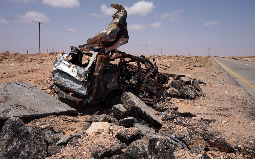 The wreck of a vehicle used by an Islamic State suicide bomber, near Sirte.