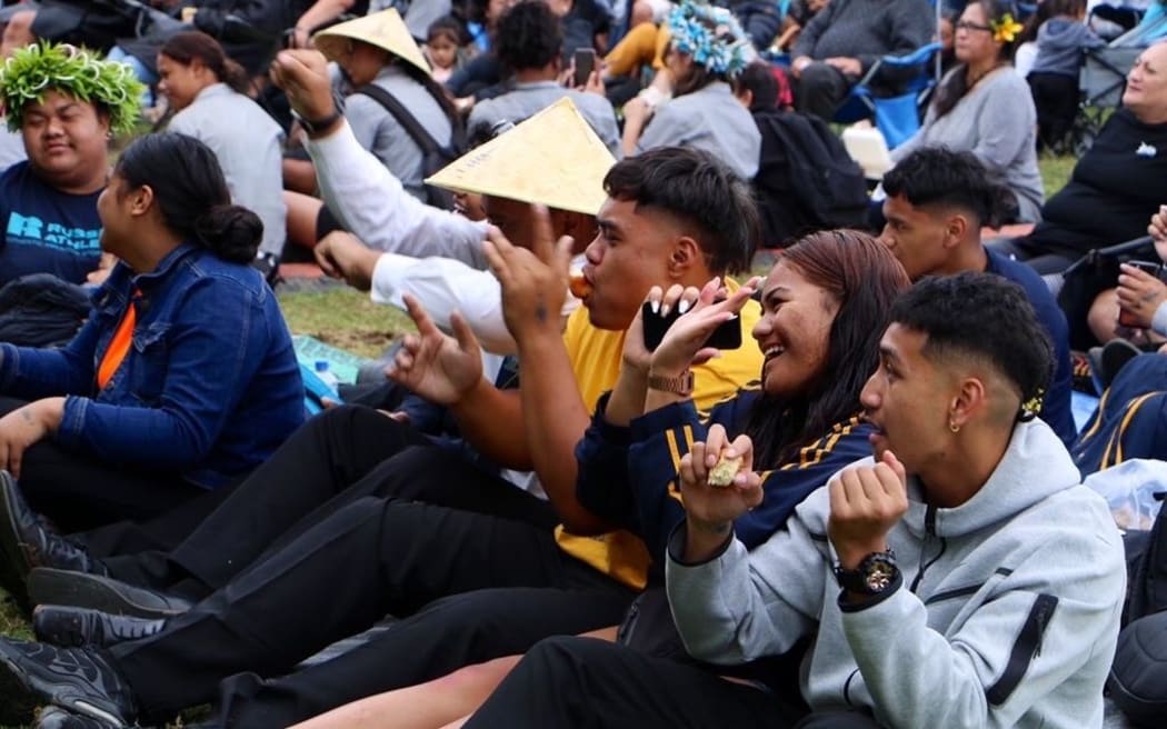 Spectators dancing along to live music on stage - day 2 Polyfest 2021