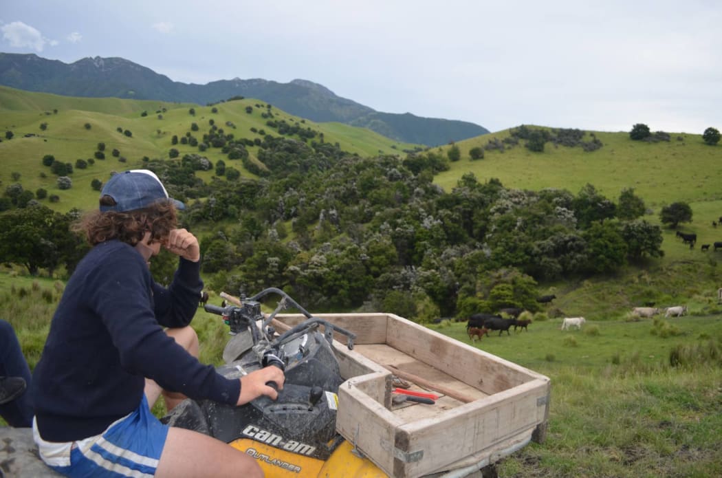 An image of James Moore on a quadbike.