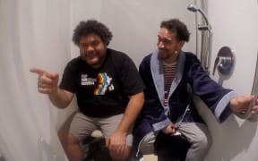 James Nokise with Josh Thomson in shower (RNZ)