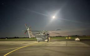 The Royal New Zealand Air Force deployed a helicopter to rescue a freezing tramper and his dog in the Tararua Ranges north of Wellington.