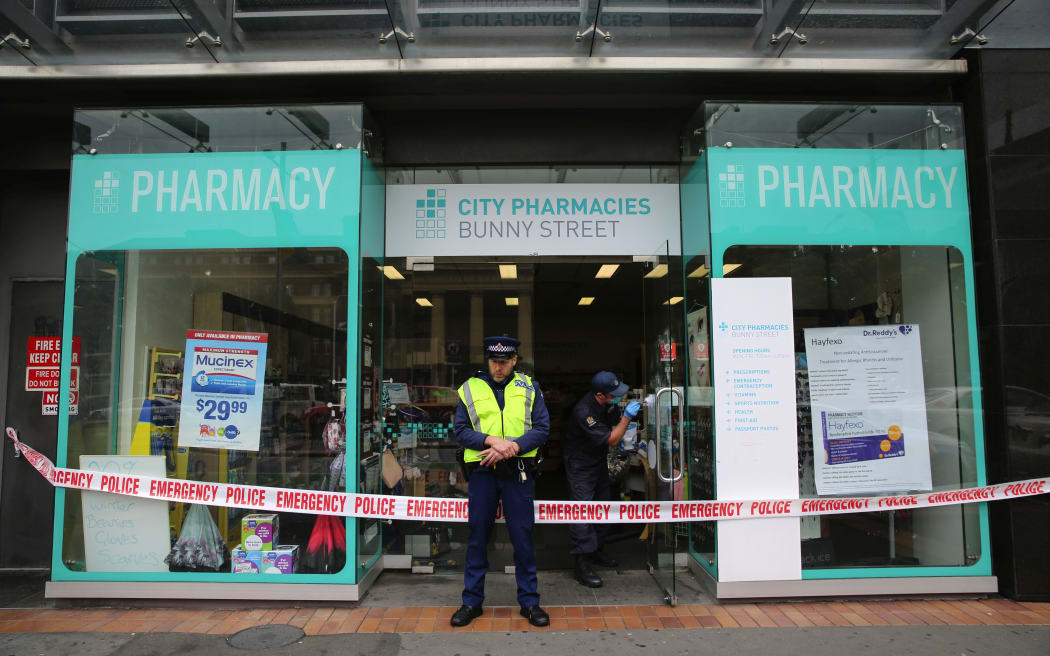 Police at the scene of a pharmacy robbery in central Wellington