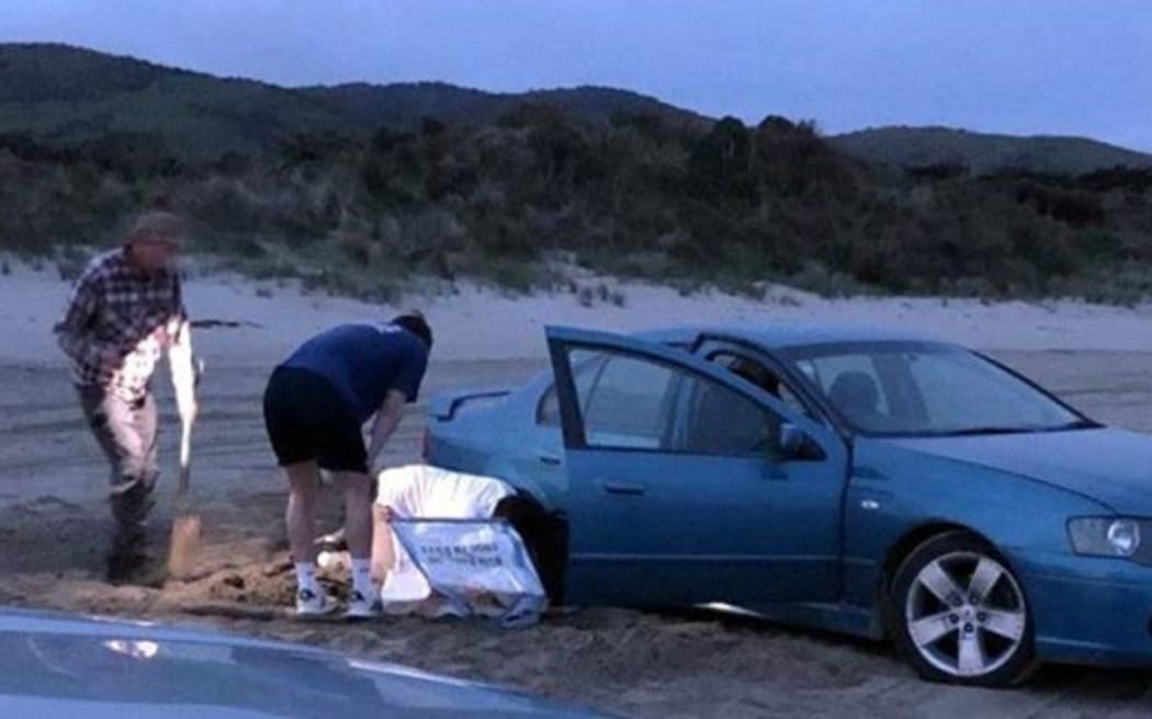 A vehicle stuck after allegedly doing “doughnuts” at Cannibal Bay. The occupants received “stern advice” from a council ranger.
