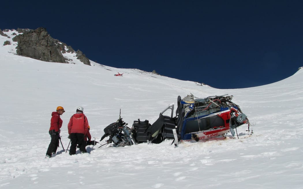 Crumpled helicopter on the snow