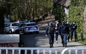 Police officers cordoned off an area near the house of French businessman Bernard Tapie and his wife Dominique Tapie in Combs-la-Ville, southeastern suburbs of Paris.