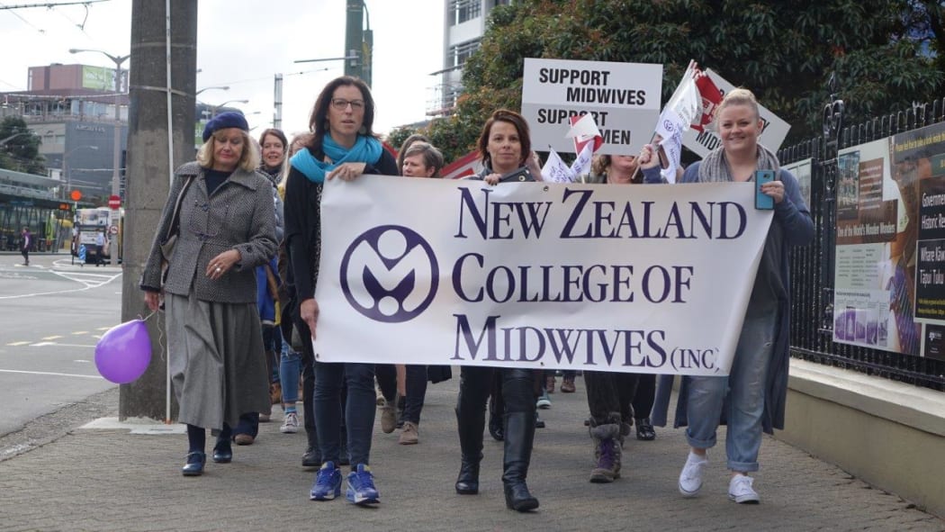 Midwifes march in Wellington for pay equity.