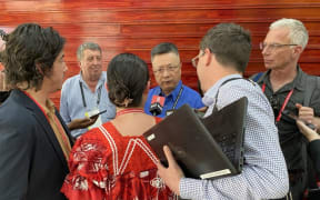 China's Pacific ambassador Qian Bo fronting the media in Tonga.