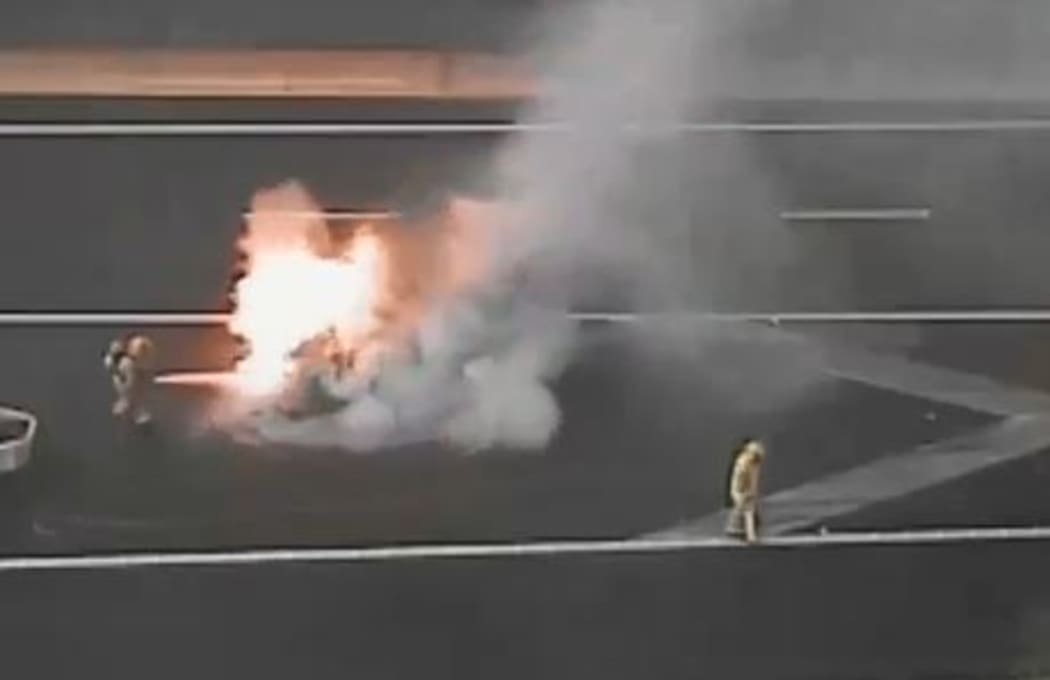 The car is reported to be just off the motorway, where State Highway 1 connects with State Highway 20, near Lambie Drive.