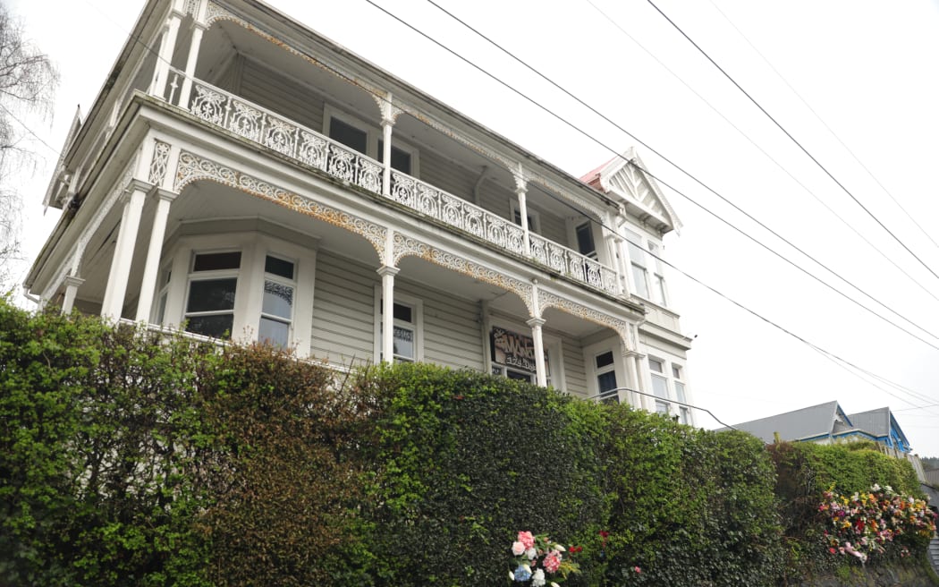 Flowers placed outside the flat in Dundas Street, Dunedin where 19-year-old Sophia Crestani died during a party on Saturday 5 October.