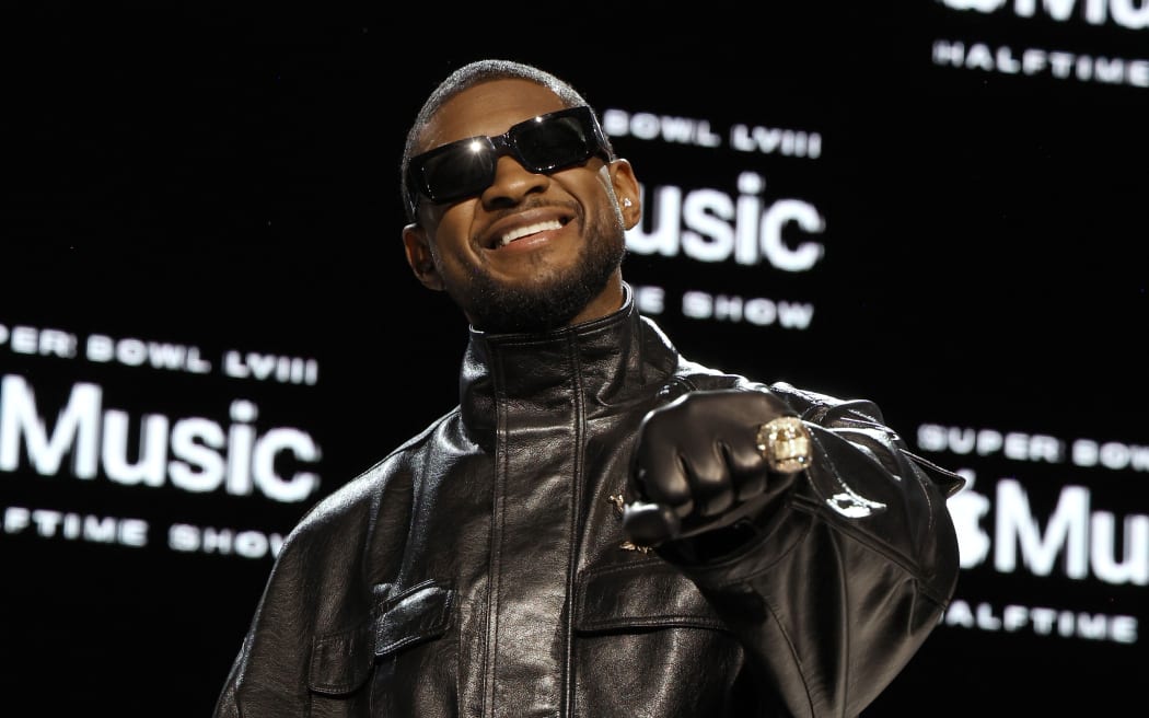 Usher attends the Super Bowl LVIII Pregame & Apple Music Super Bowl LVIII Halftime Show press conference.