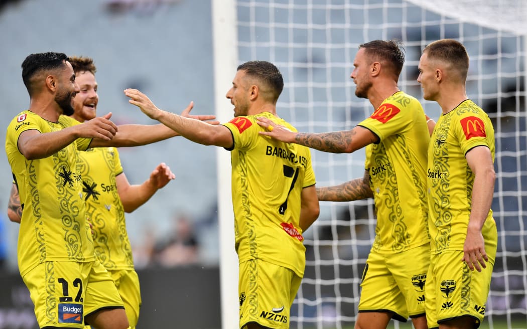 Kosta Barbarouses of the Phoenix celebrates after scoring a goal in the A-League