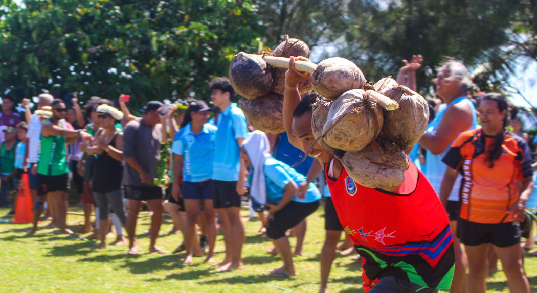 Competitors had to carry at least 12 coconuts for 25 metres.