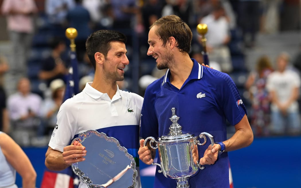 Novak Djokovic (L) and Daniil Medvedev after the 2021 US Open in New York.