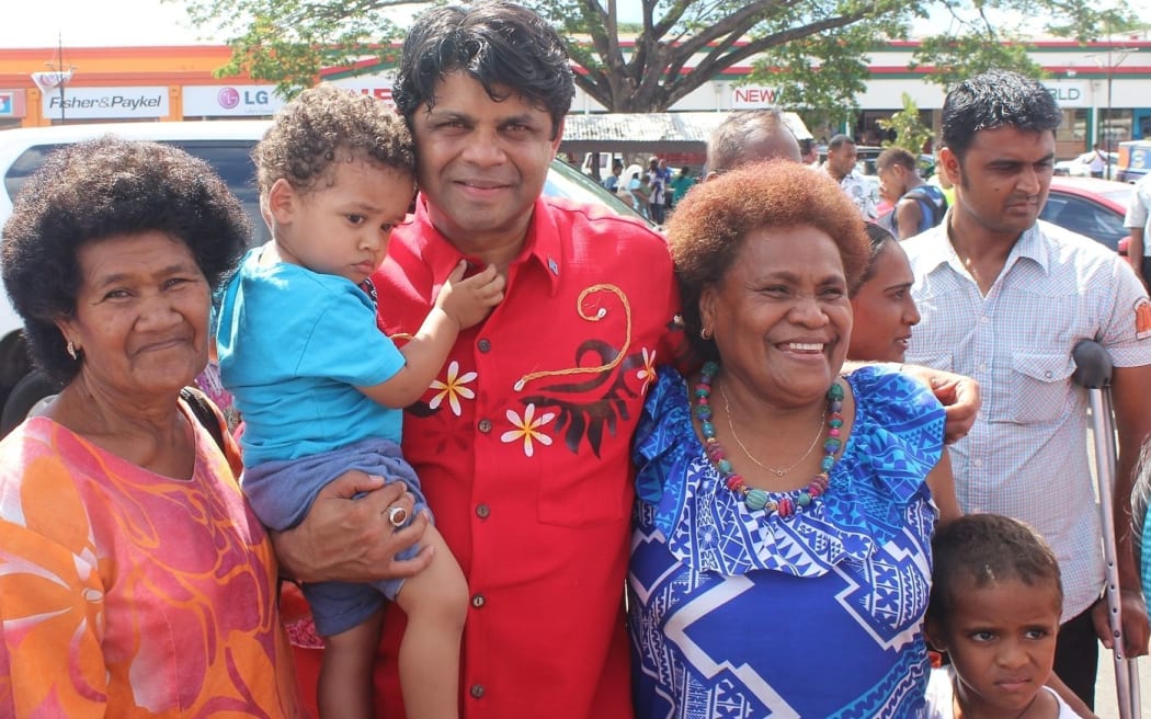 Fiji's acting Prime Minister Aiyaz Sayed-Khaiyum meets market vendors in Ba