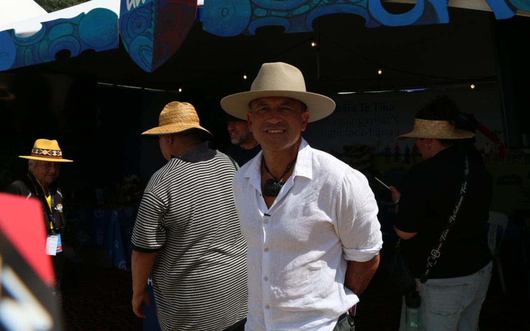 Renata Blair standing outside the ACC tent at Te Matatini o Te Kāhui Maunga