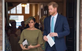 Britain's Prince Harry, Duke of Sussex and Meghan, Duchess of Sussex  leave after the christening.