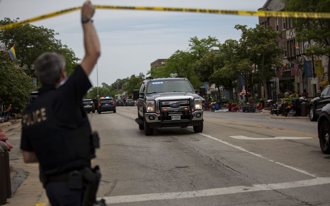 First responders at the scene of a shooting at a Fourth of July parade in Highland Park, Illinois.
