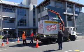 Greenpeace drop off the site office of the proposed Ruataniwha Dam at the Hawke's Bay Regional Council.