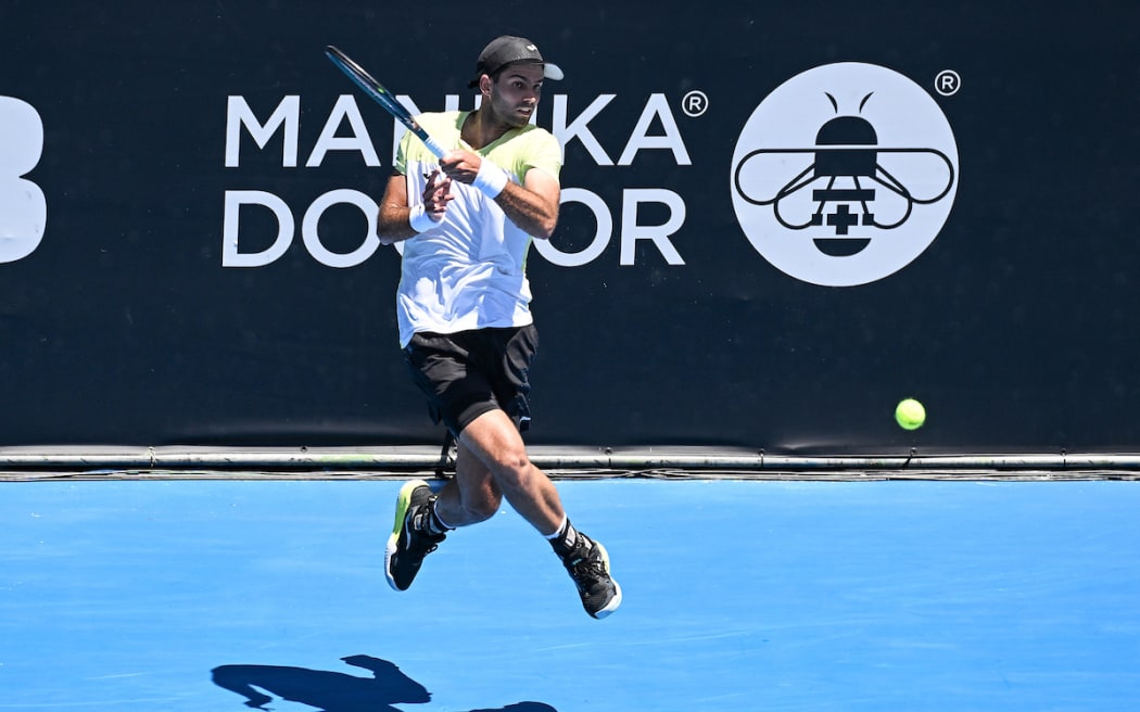 Facundo Diaz Acosta of Argentina plays a shot against Gael Monfils of France in the Quarter Final Men’s Singles Match of the 2025 Men’s ASB Classic.
