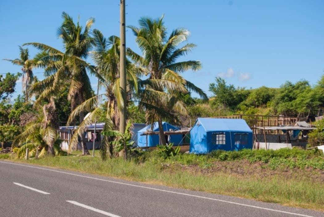 Blue tents dot the post-Cyclone Winston landscape of Fiji.